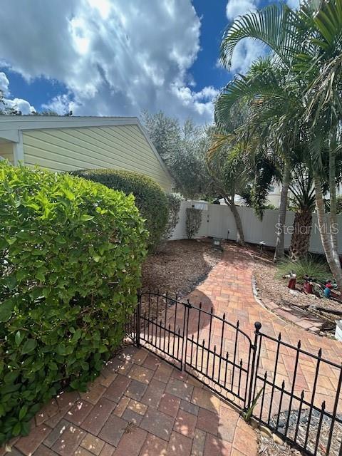 Back yard with gated alley access.