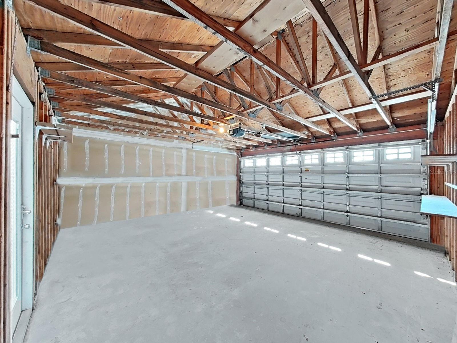 Detached over sized double car garage.