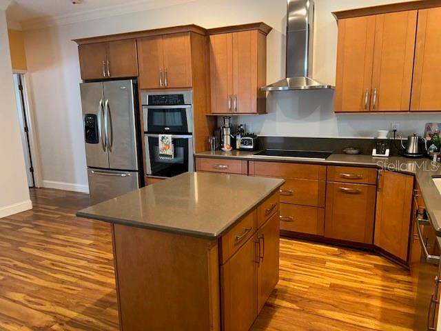 Newer kitchen cabinets, appliances, countertops, flooring & lighting.