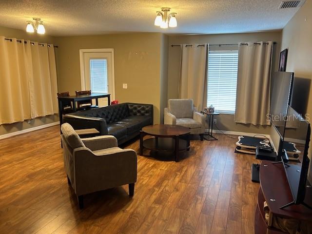 18' x 26' bonus room facing front off townhome with private entry.