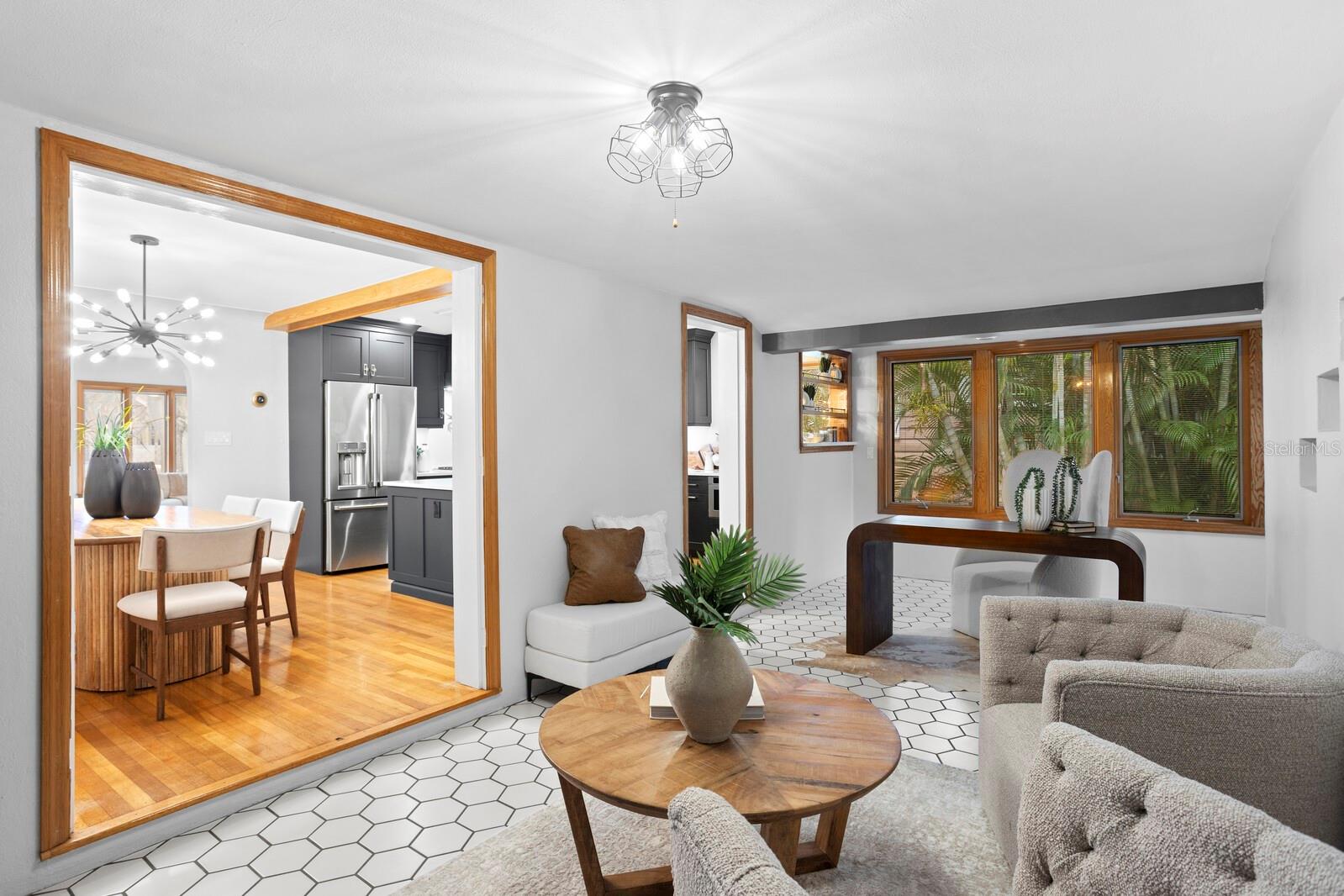 Open floor plan flows to bonus room