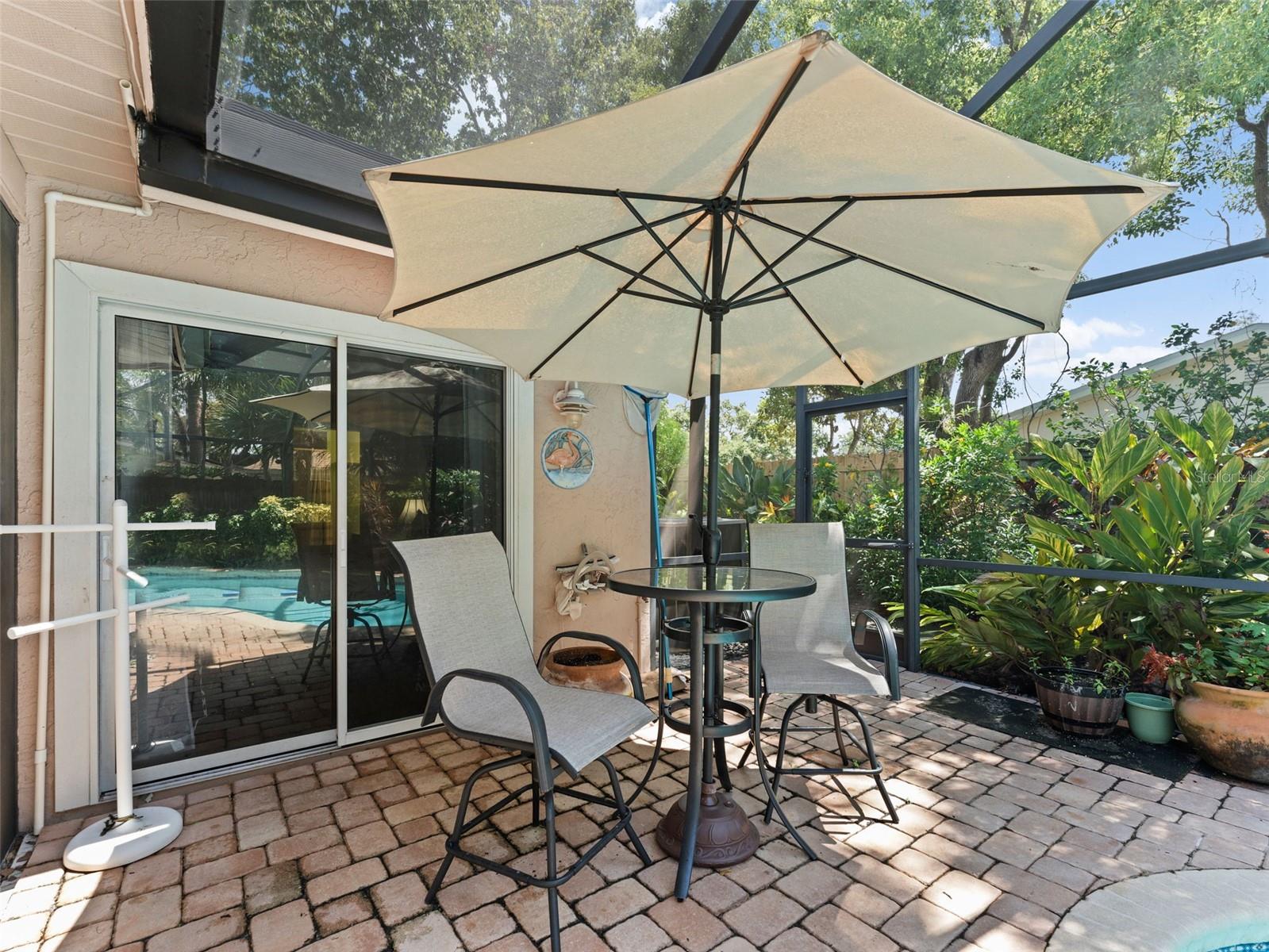 Step out from the primary bedroom to the pool!
