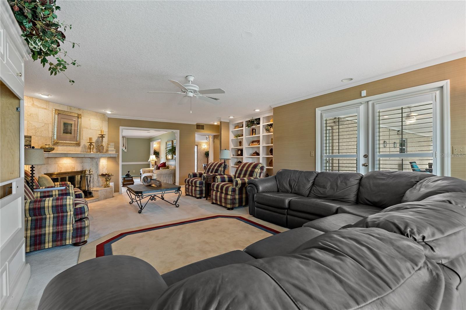 HUGE FAMILY ROOM CONNECTED TO FORMAL LIVING ROOM & DOUBLE SIDED FIREPLACE