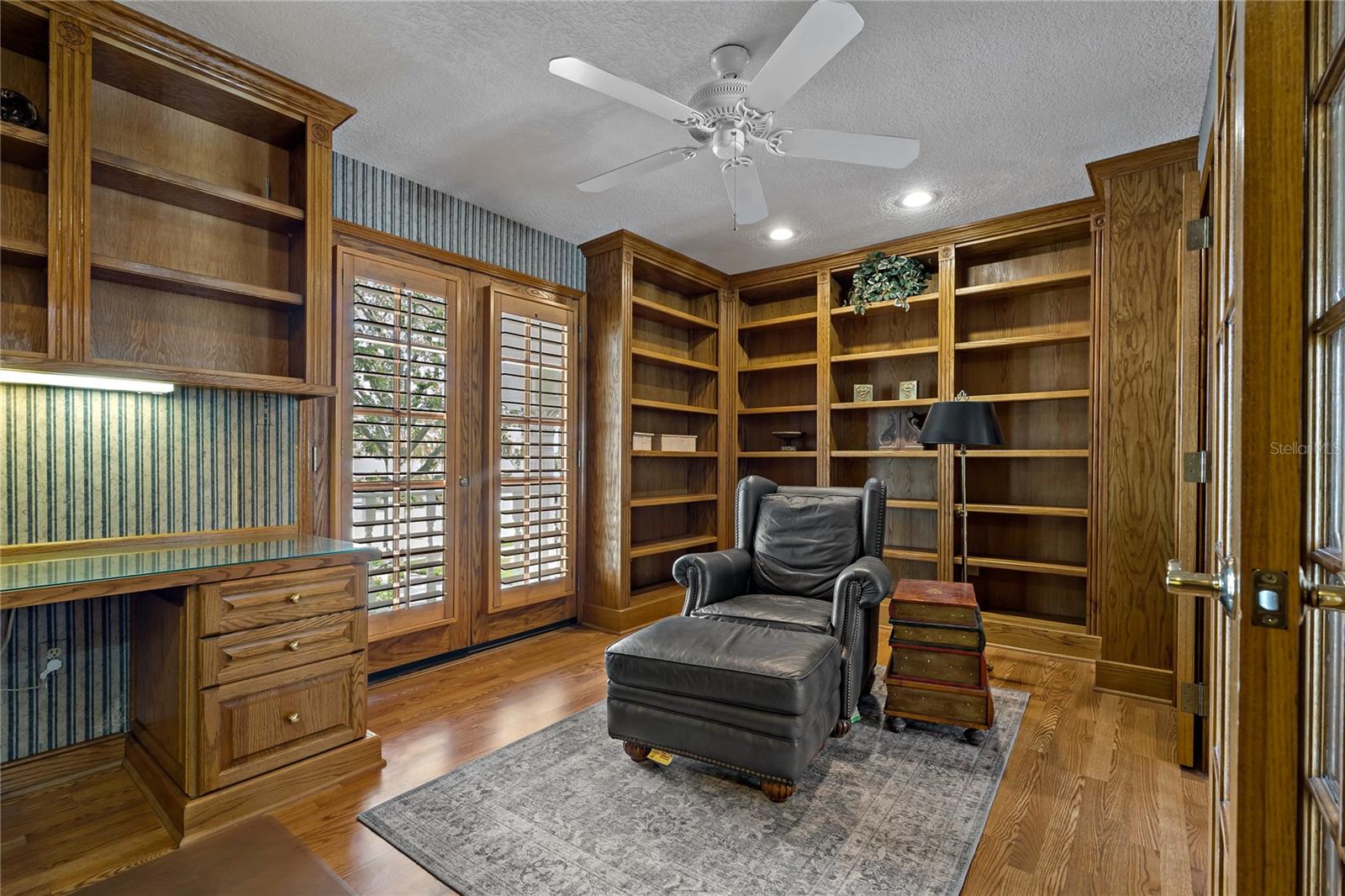UPSTAIRS OFFICE WITH ACCESS TO THE JULIETTE BALCONY IN THE FRONT OF THE HOME
