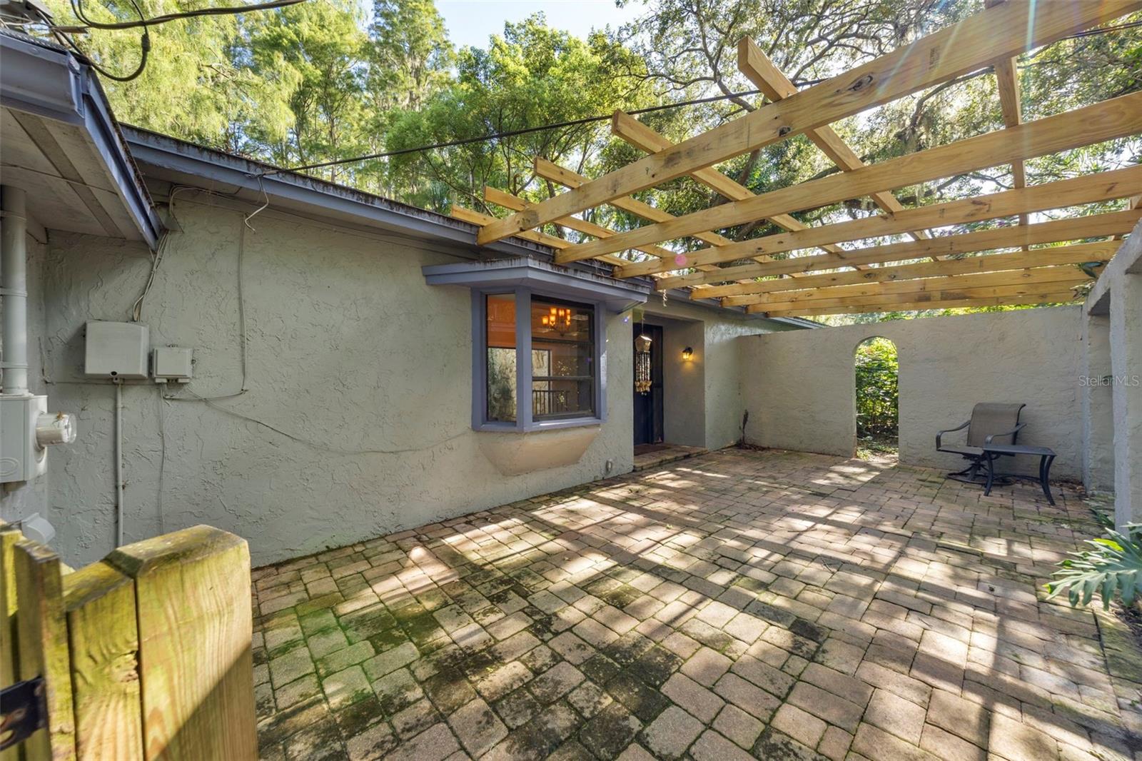 Imagine some beautiful vines and a sitting area!