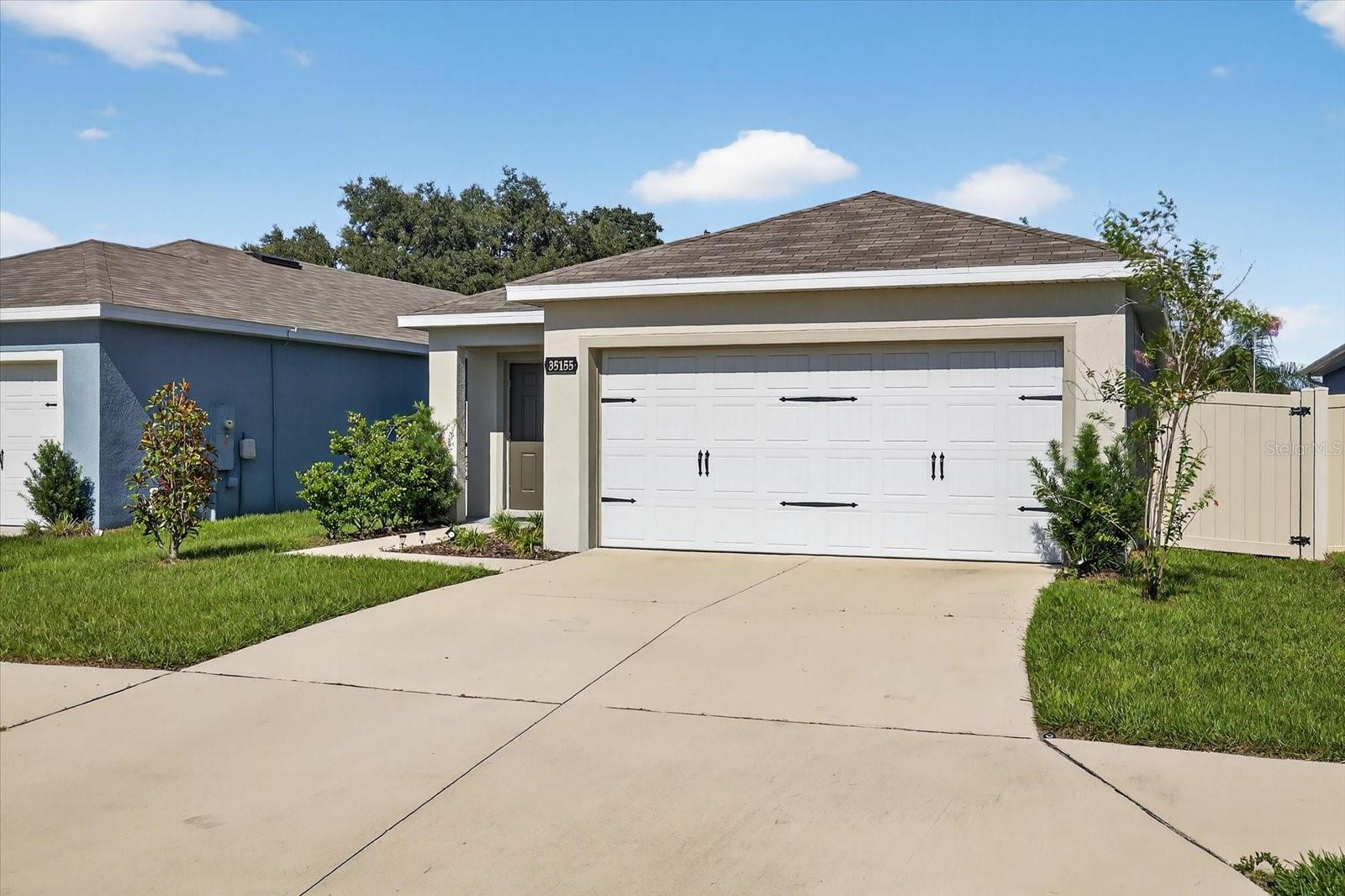 2 Car Garage with Plenty of Parking