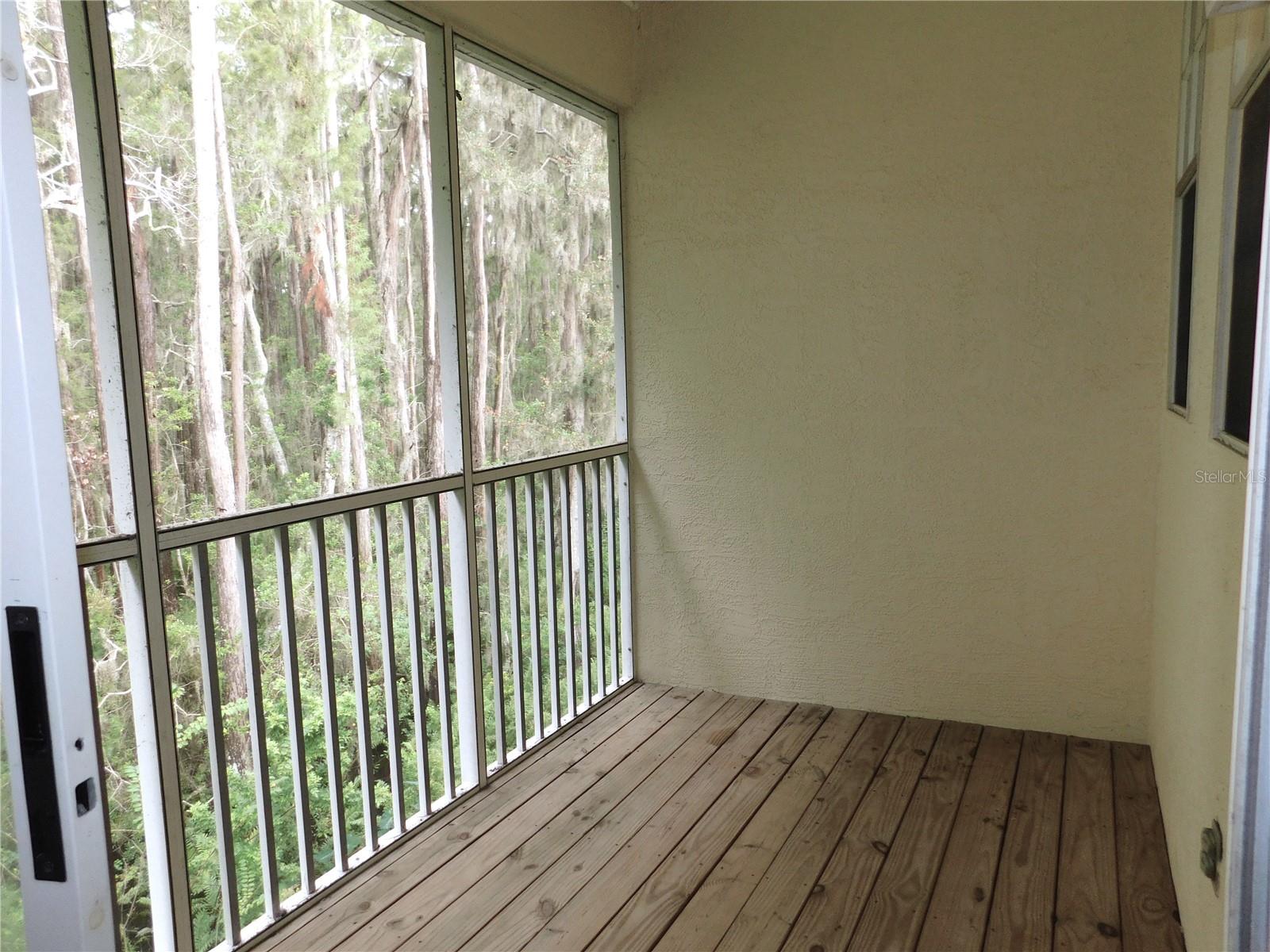 Screened deck off primary bedroom