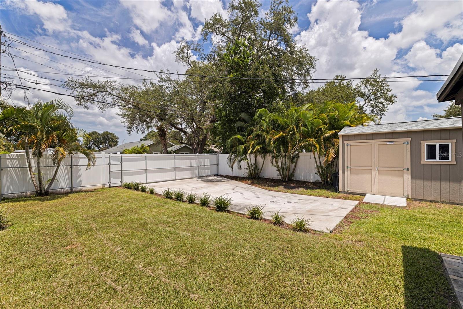 Oversized parking pad with alley access