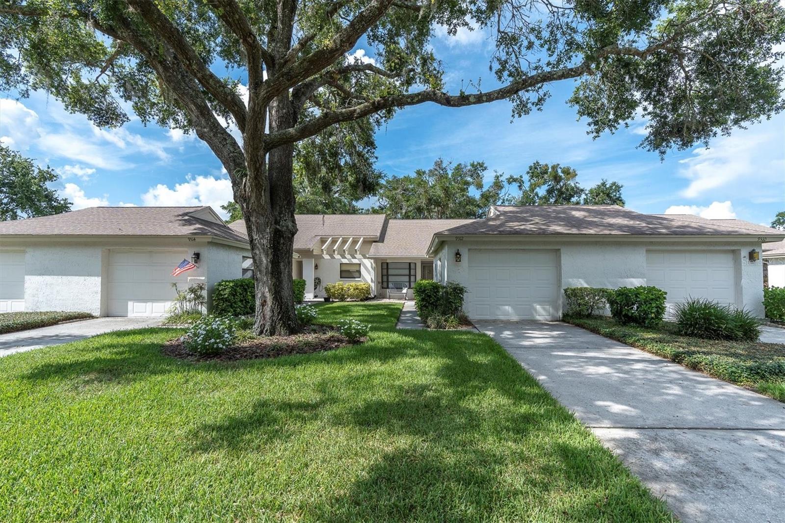 Beautiful Villa with 1-Car detached garage in the SOCIALLY Security Gated Community of Seven Springs Golf & Country Club Community.