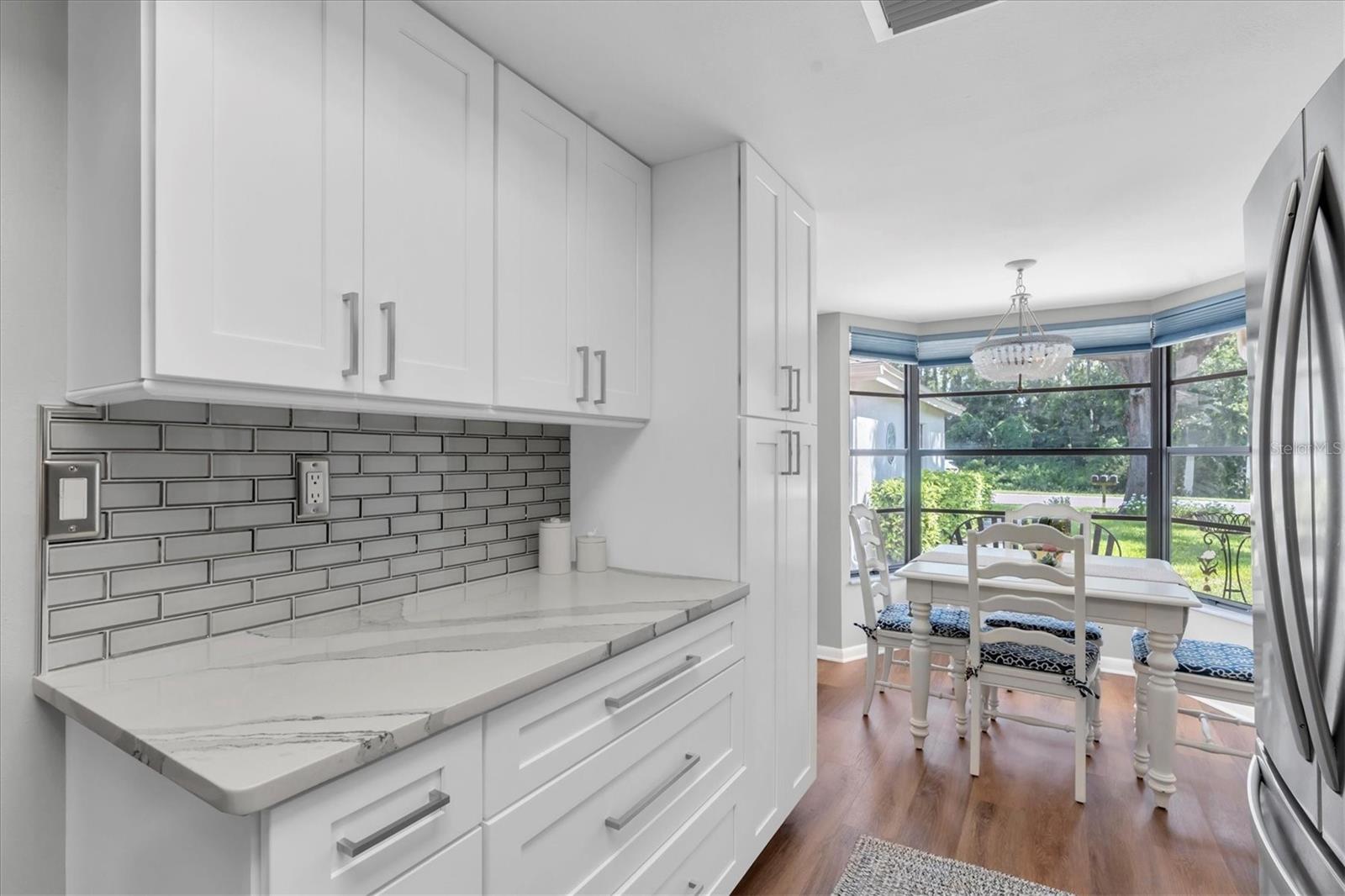 Beautiful new Kitchen with quartz counters, stainless appliances, and plenty of room for food prepping