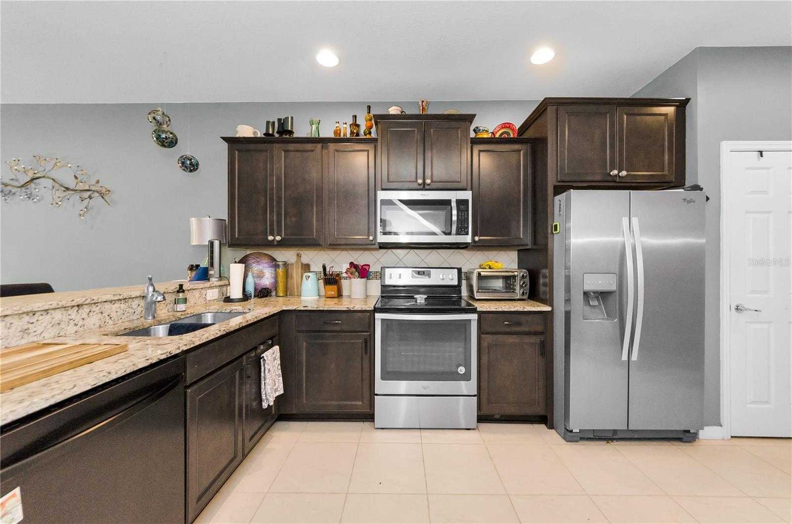 Kitchen area with breakfast bar