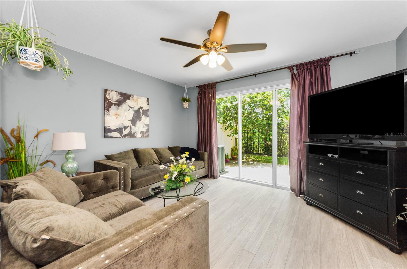 Lovely great room with triple sliders