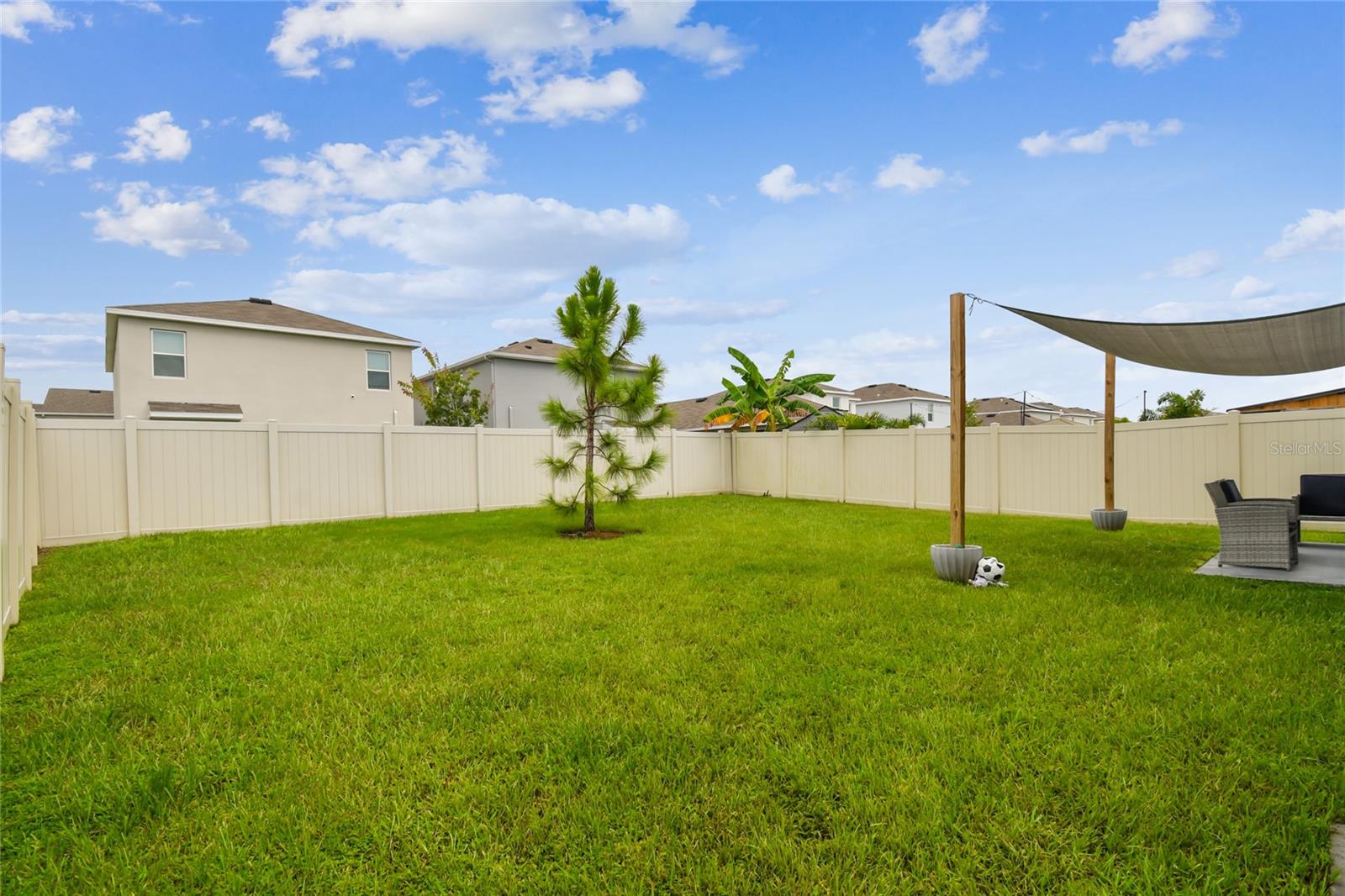 Private, fenced backyard