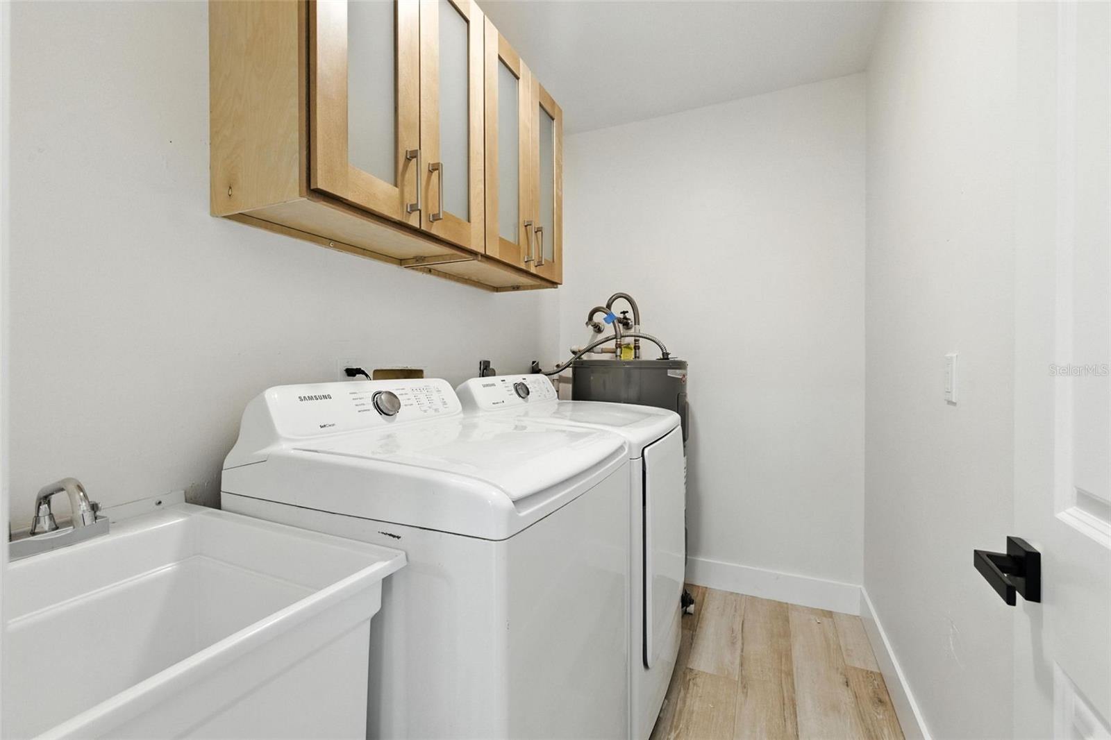 Indoor Laundry Room with Utility Sink