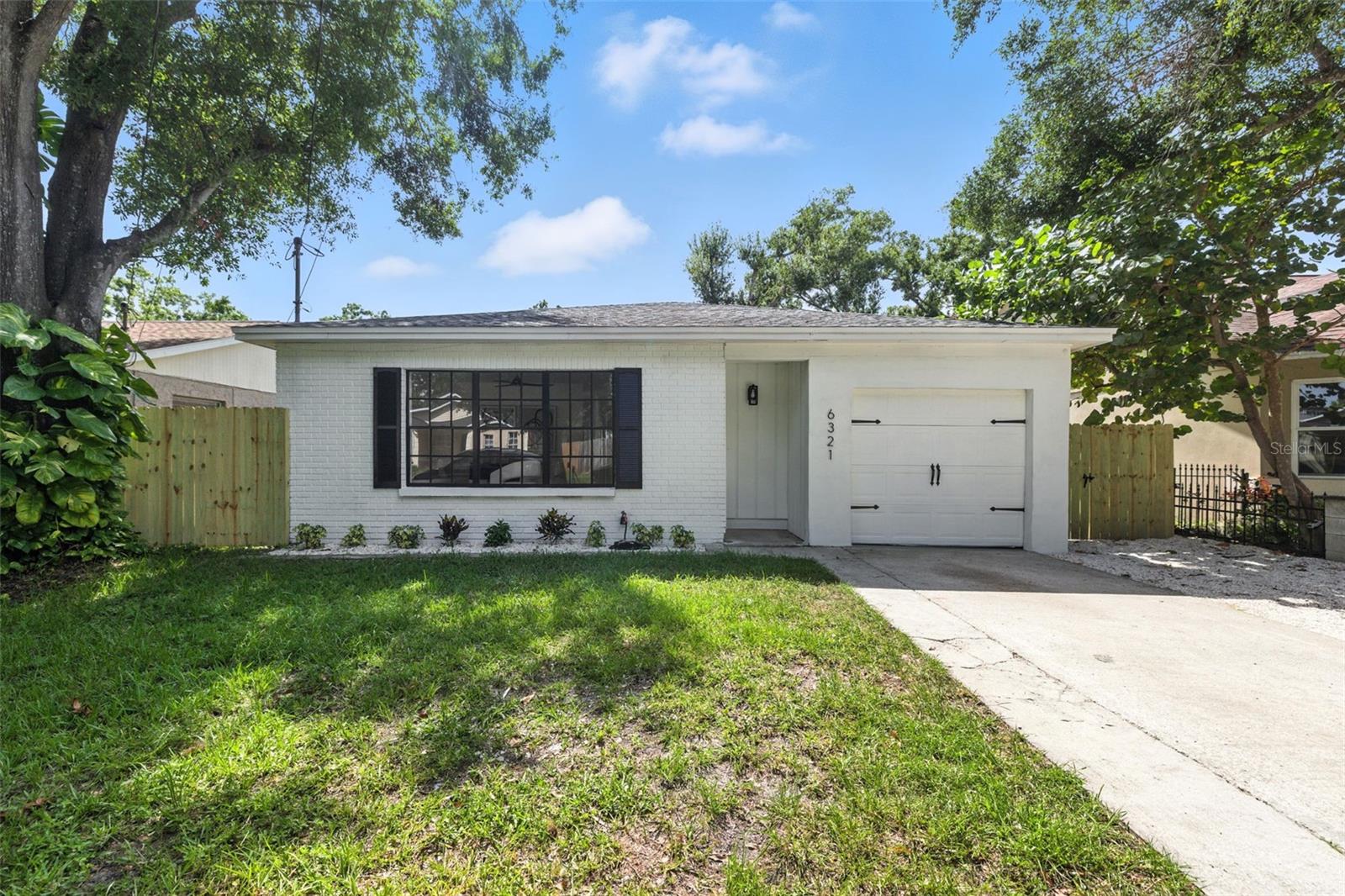 Exterior with One Car Attached Garage