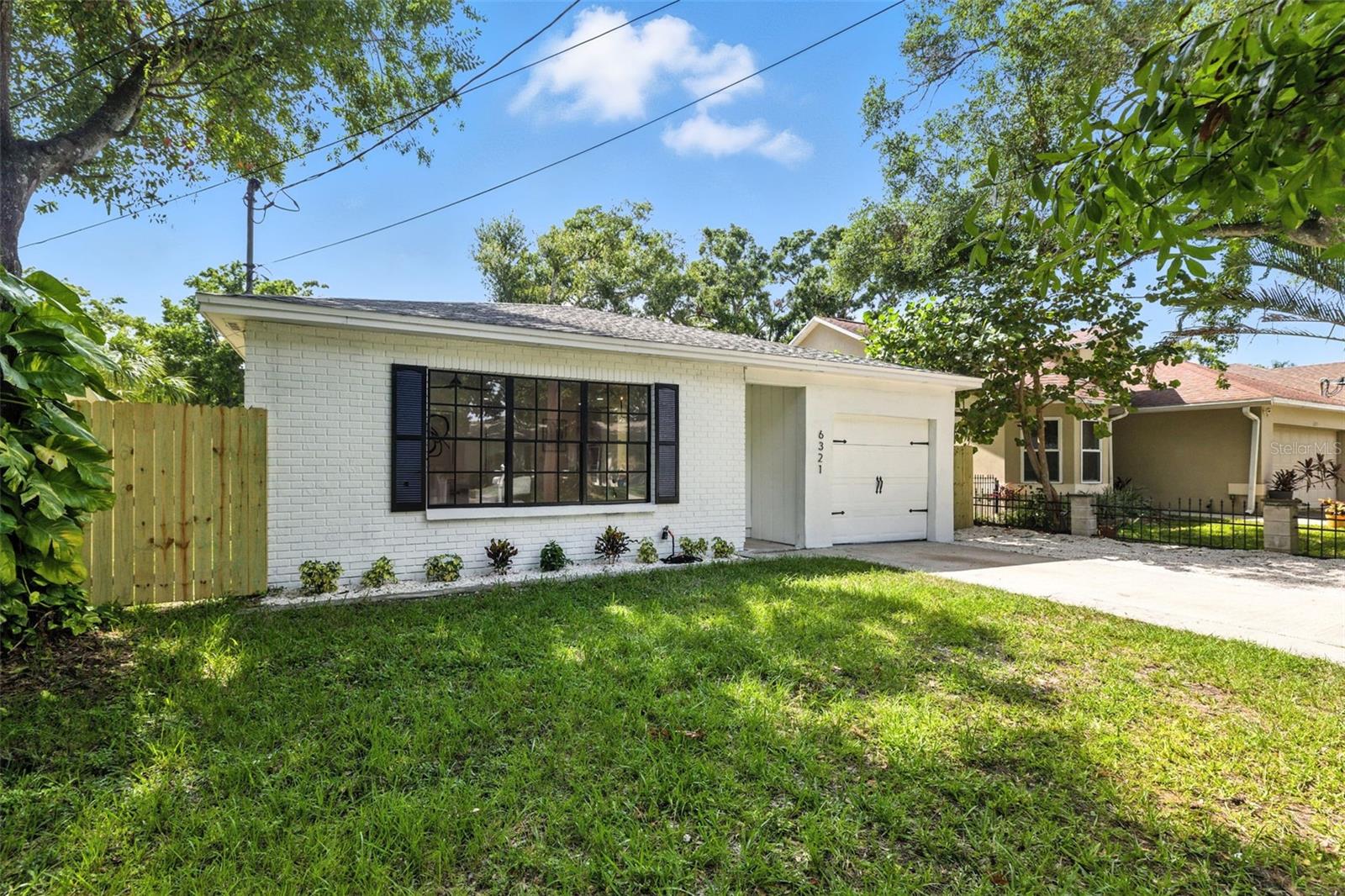 Exterior with One Car Attached Garage