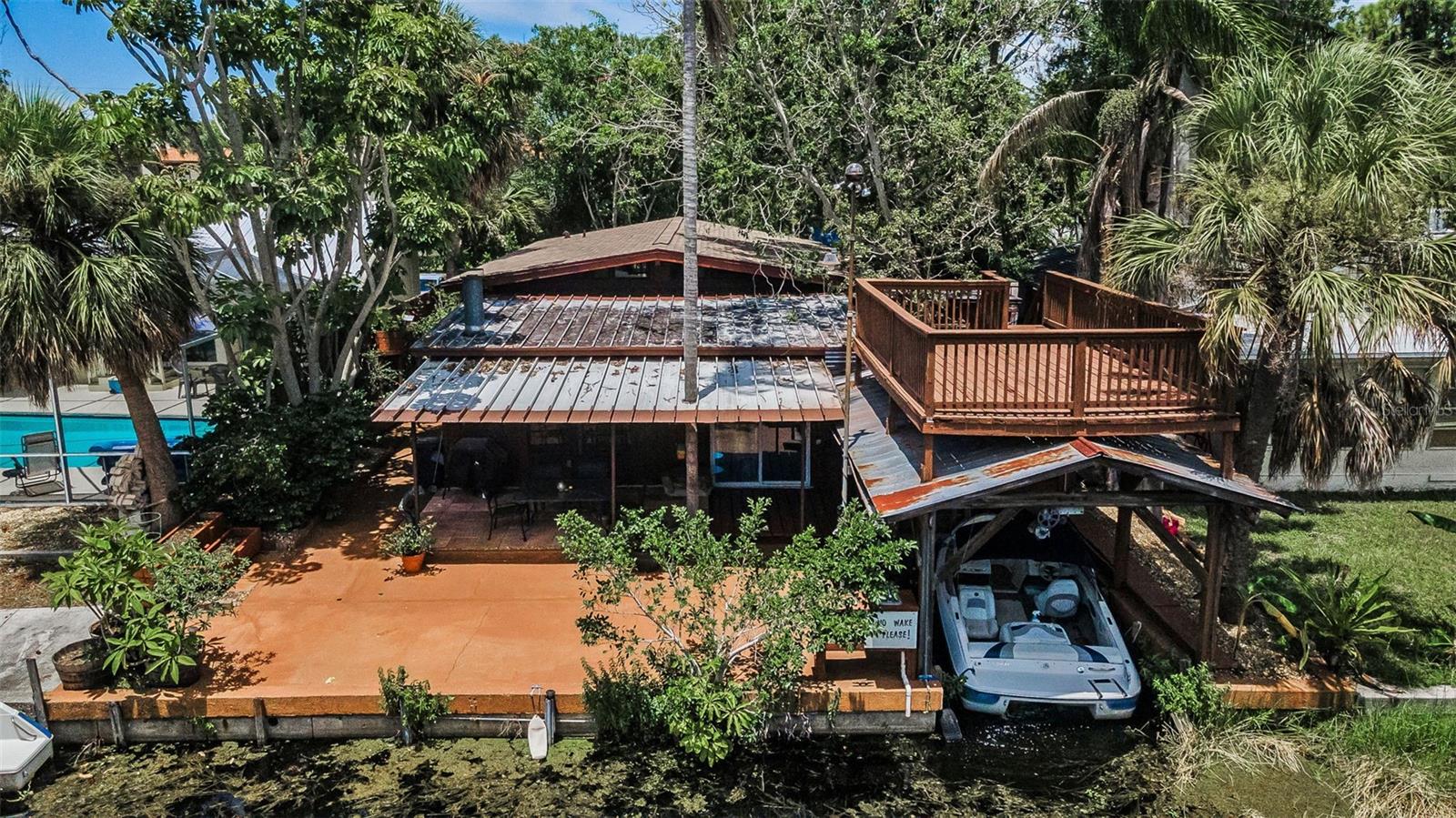 rear of home with boathouse
