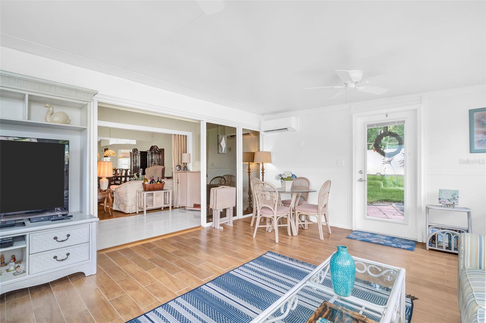 Access to main living and hurricane-impact door to back patio~