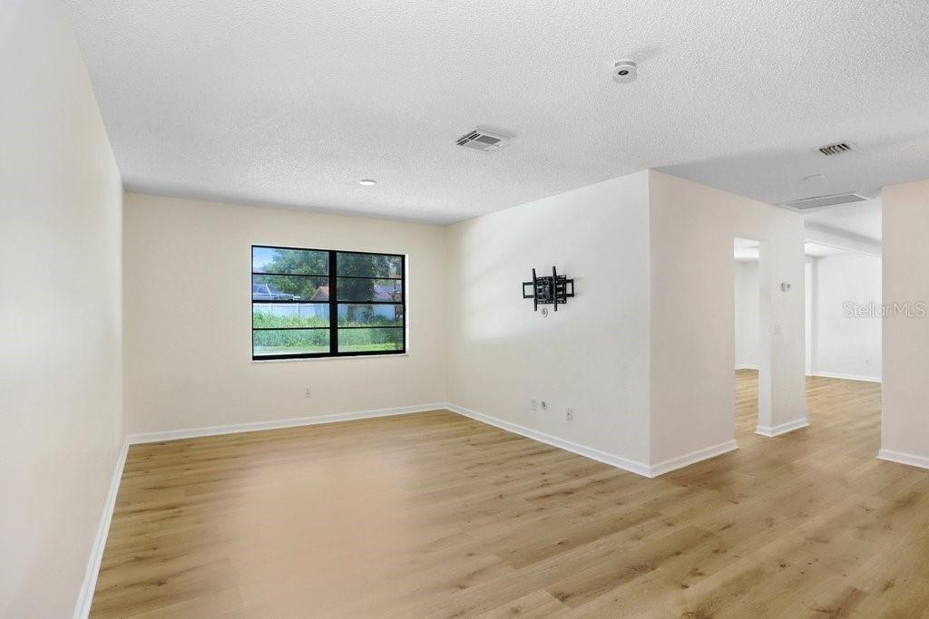 Gorgeous new flooring + interior paint compliment the thoughtfully designed floorplan.