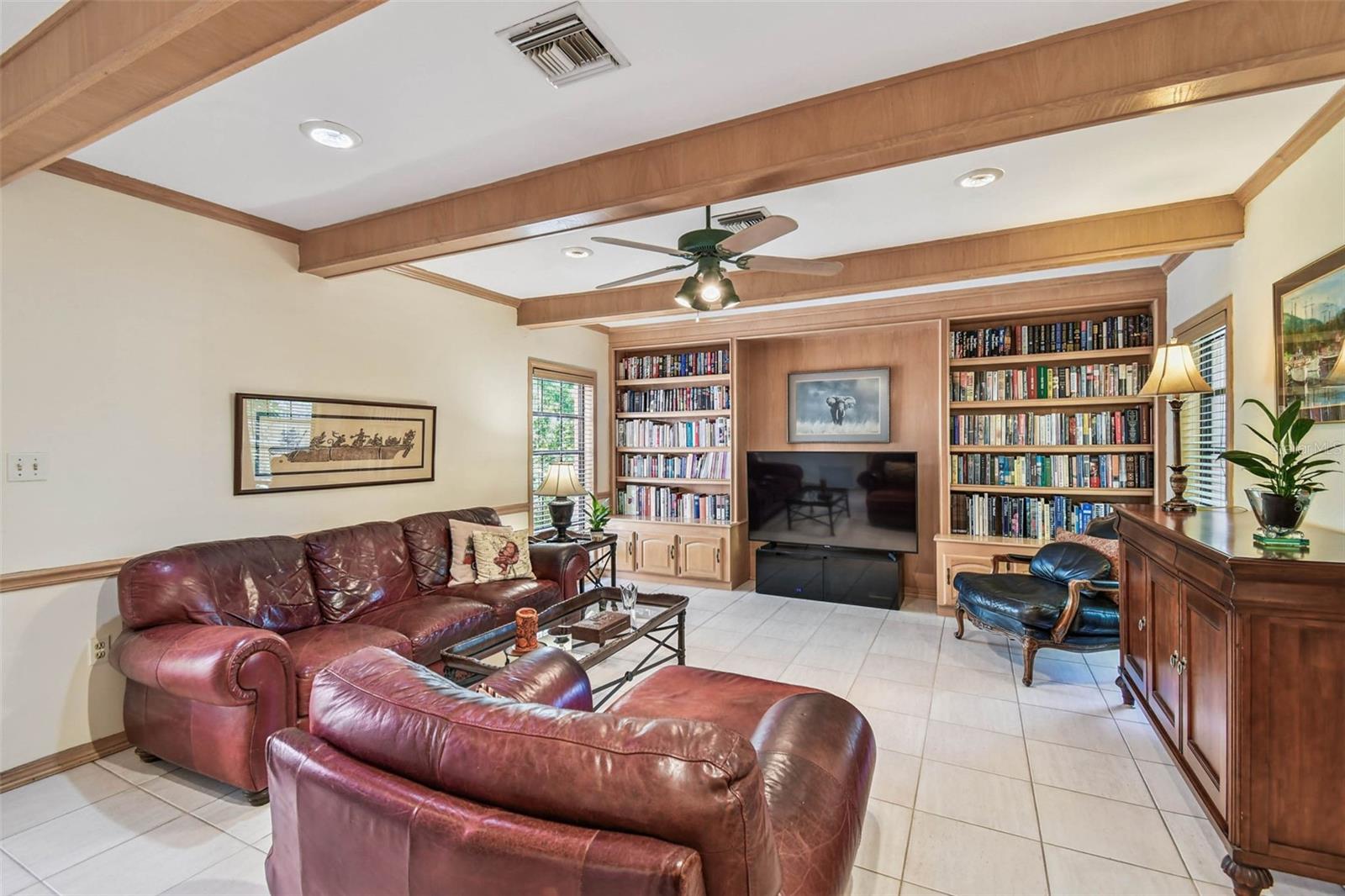Family room with wood-beamed ceiling. Very spacious!
