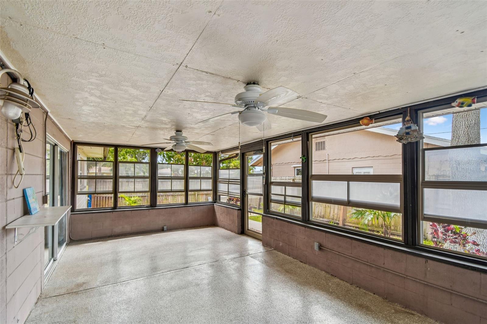 Back patio with vinyl windows