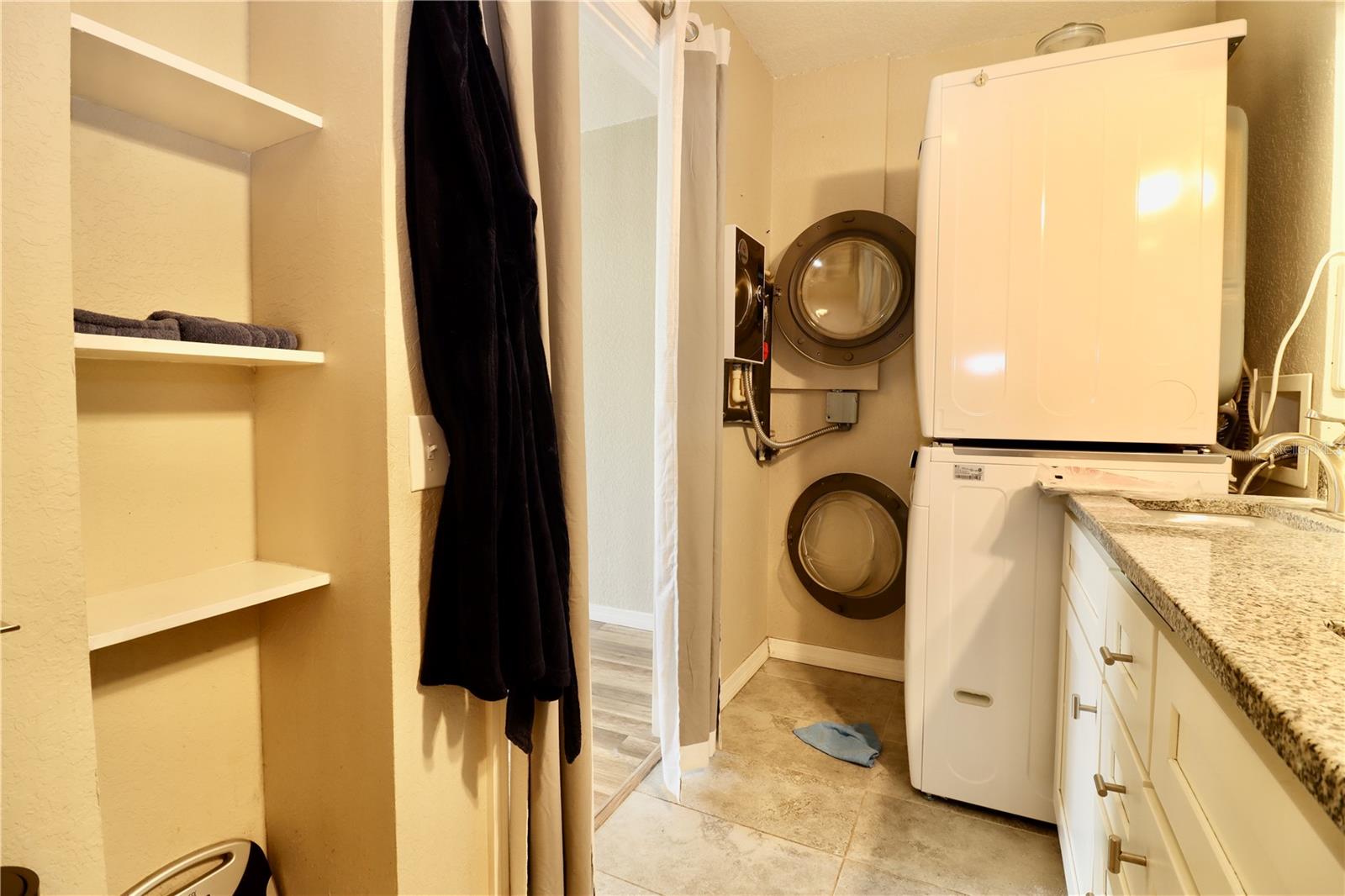 Master Bathroom with washer and dryer
