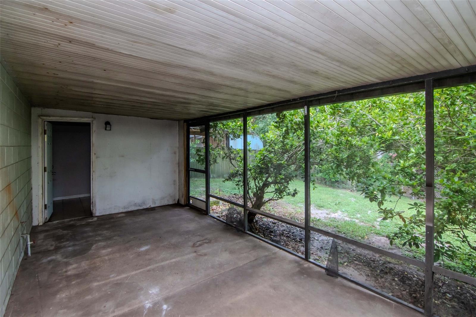 Laundry room connects to the covered, screened lanai.