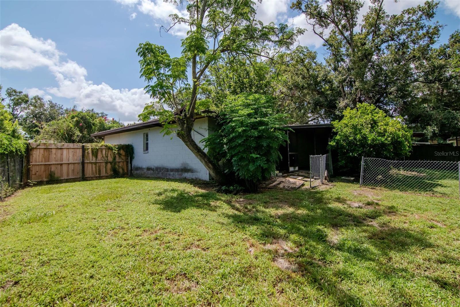 The backyard is fenced and cross-fenced.
