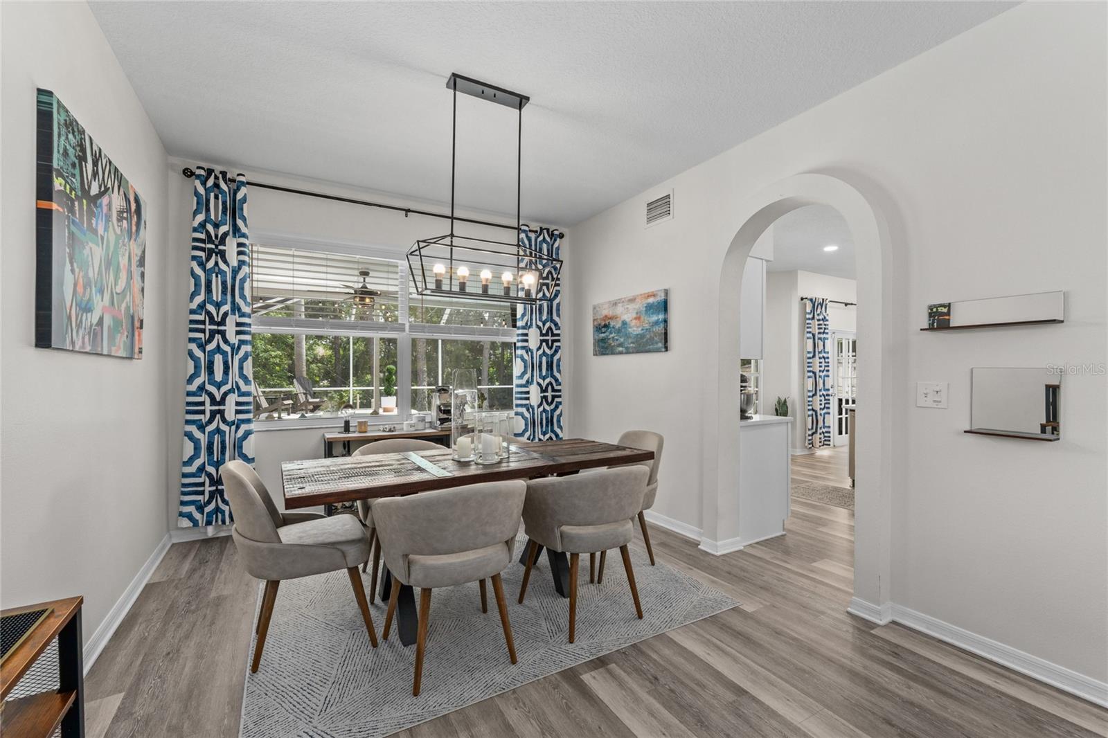 Follow the archway to the Kitchen