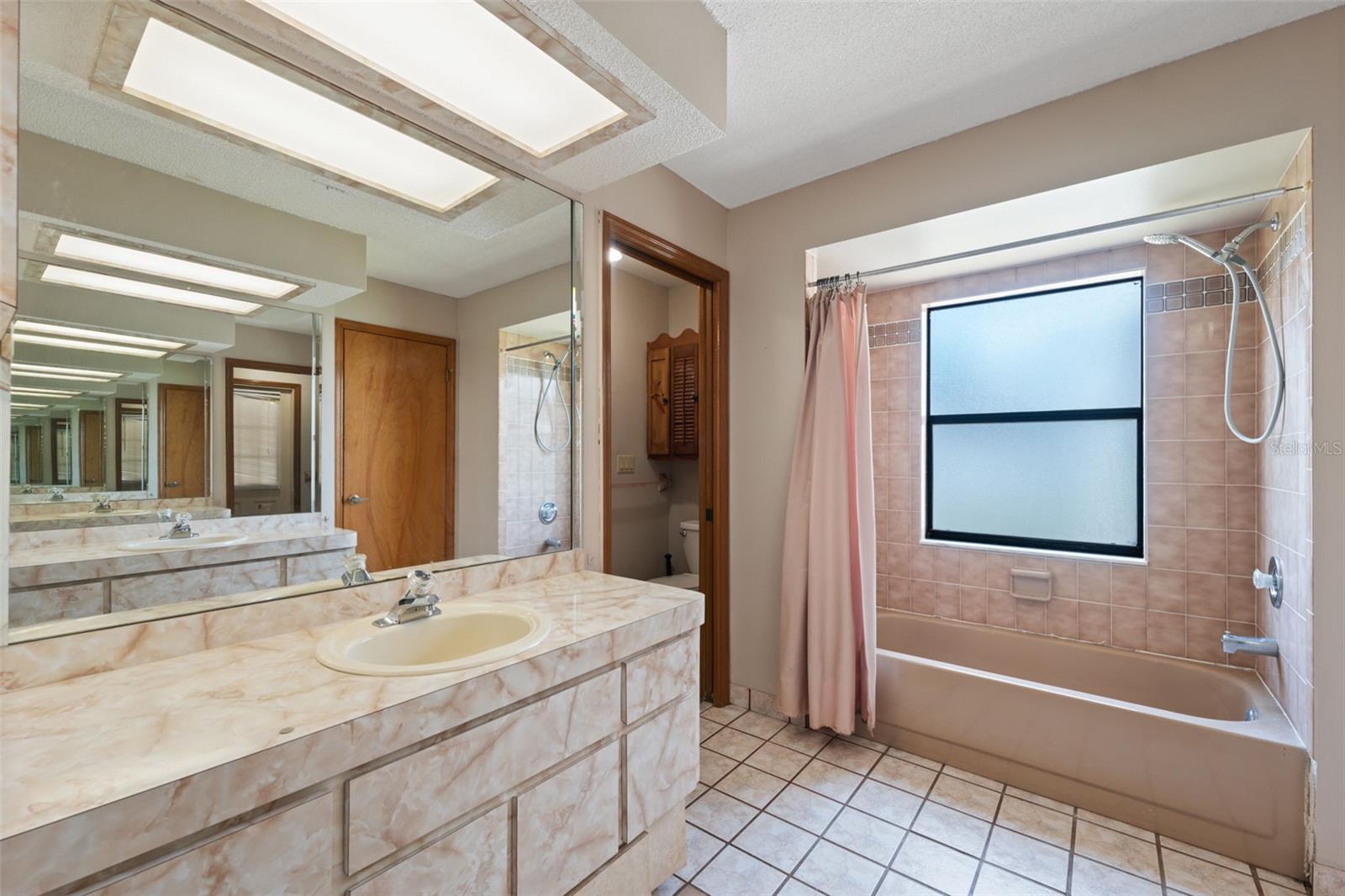 Primary bath has a tub and a separate walk-in shower!