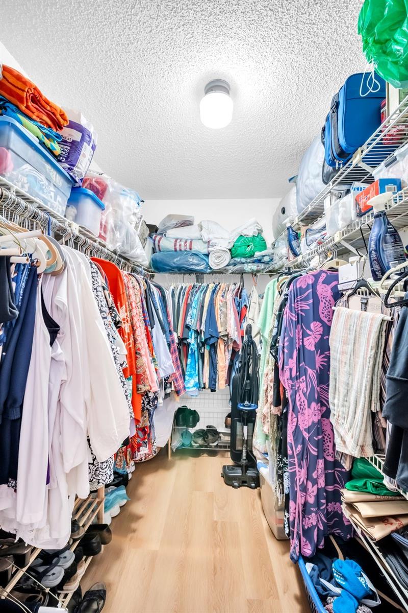 PRIMARY BEDROOM WALK-IN CLOSET