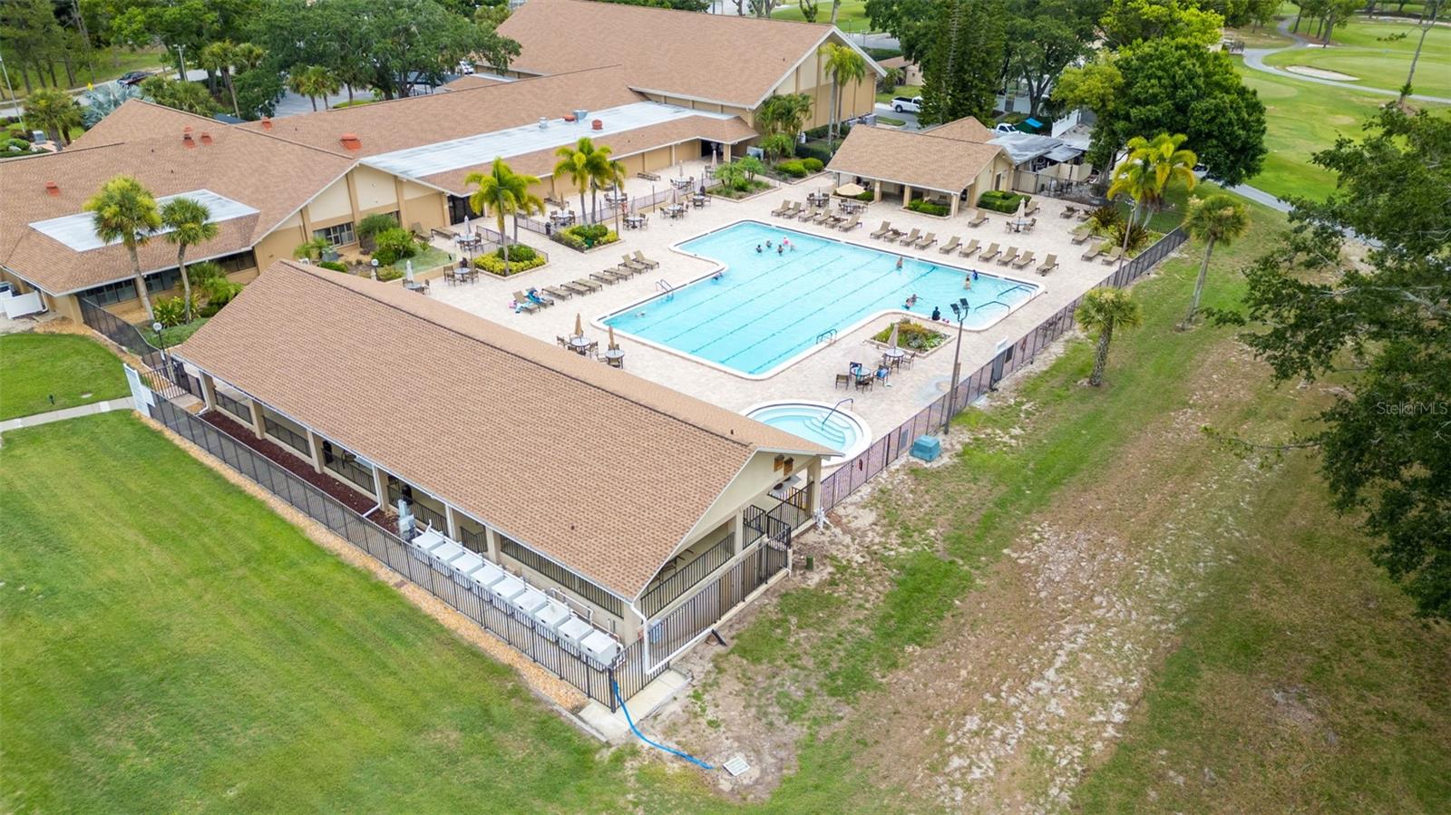 LARGE LOVELY CLUBHOUSE. HEATED WHIRLPOOL SPA. POOL IS HEATED AND COOLED FOR YEAR ROUND ENJOYMENT.