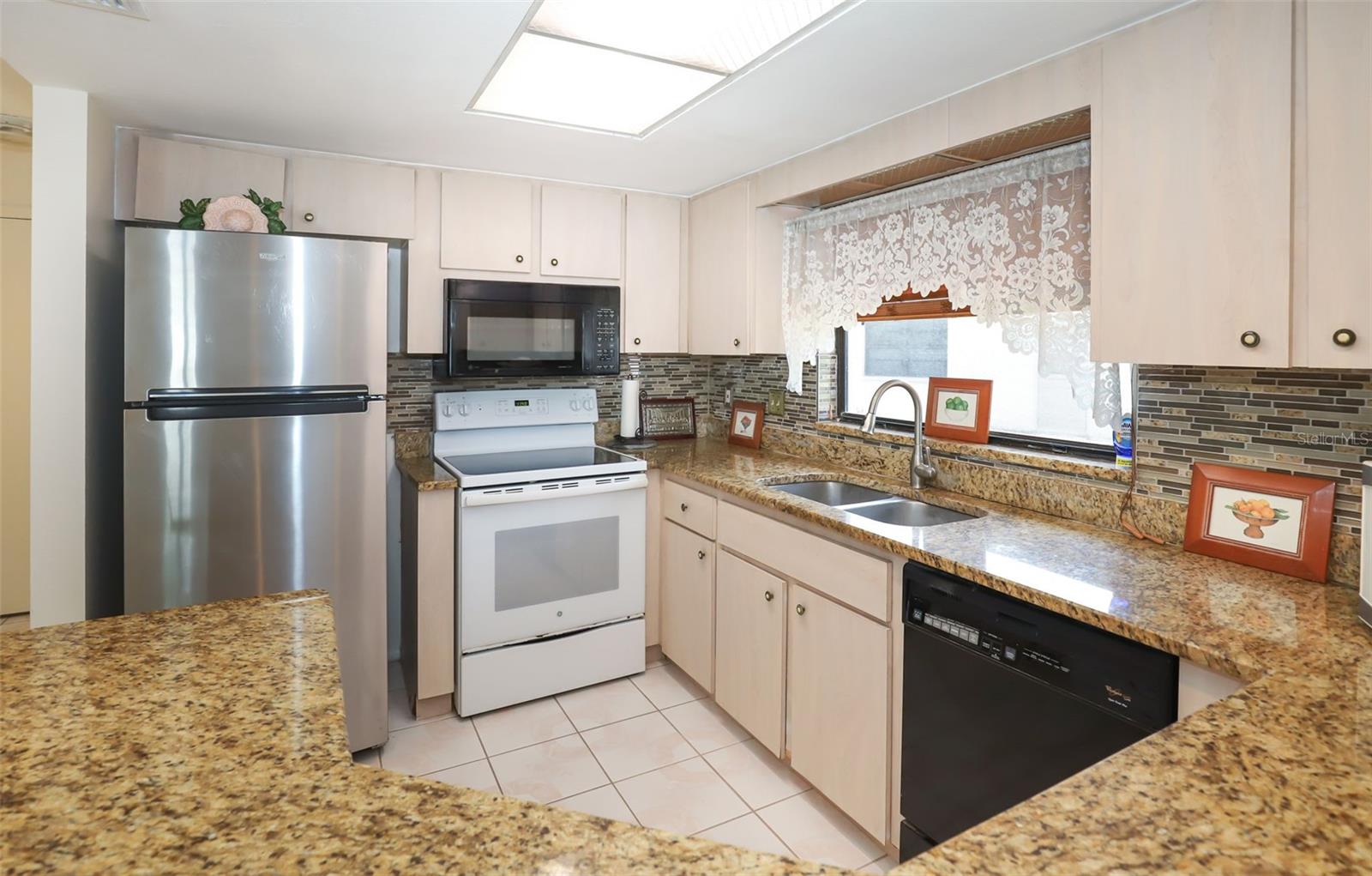 Kitchen with granite countertops
