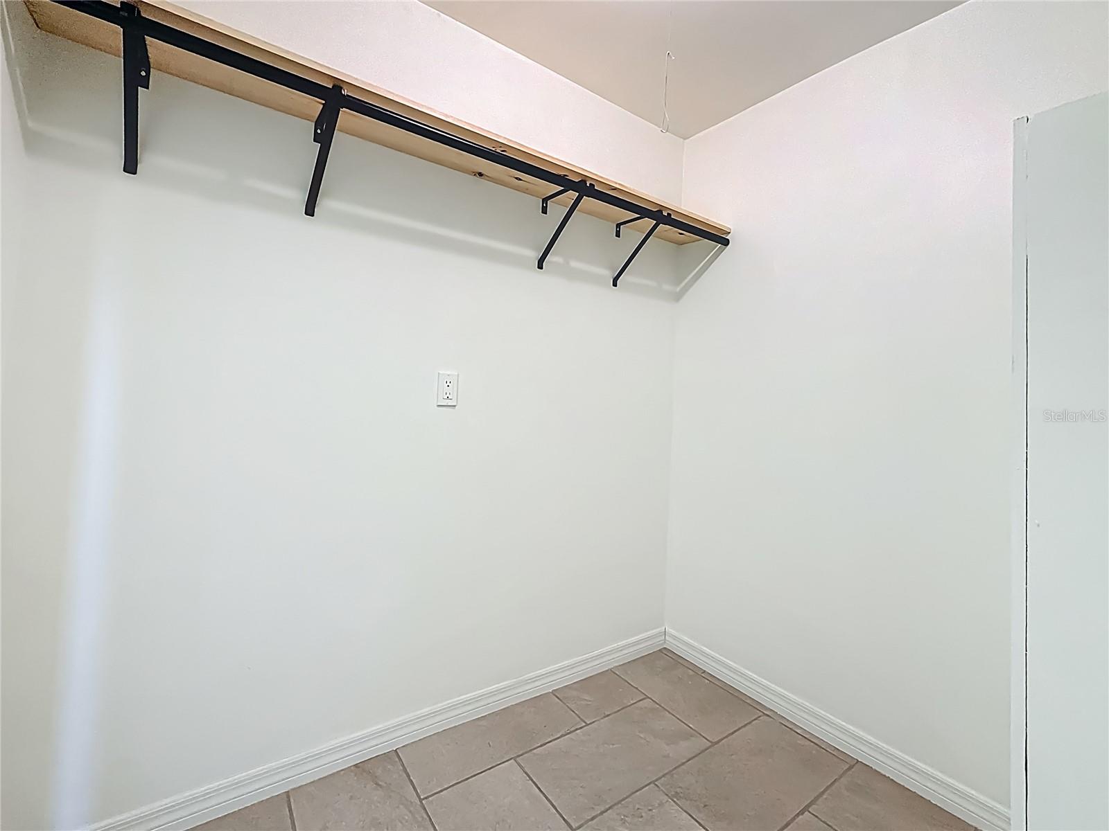 Large Walk-In Primary Bedroom closet