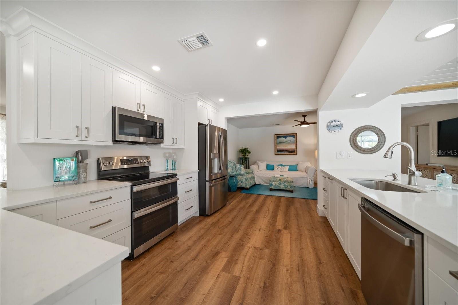 Spacious ktichen has been updated to perfection with extensive counter and cabinet space.