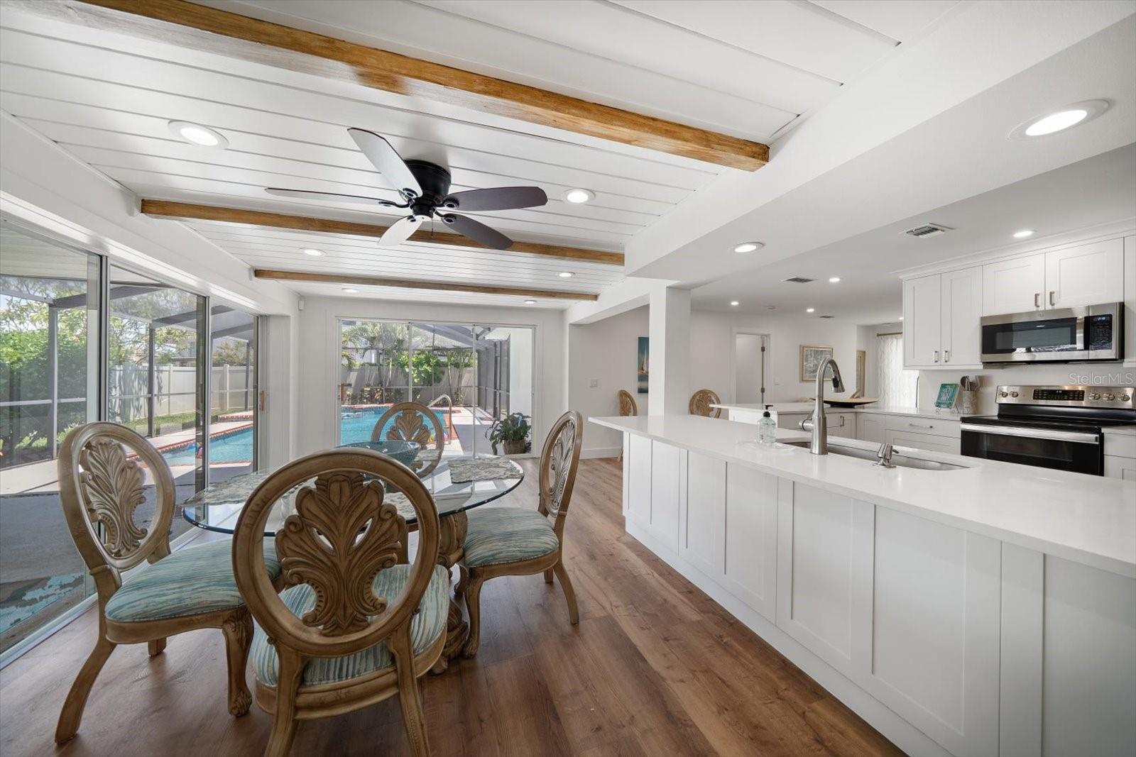 Separate dining area adjoins the family room area
