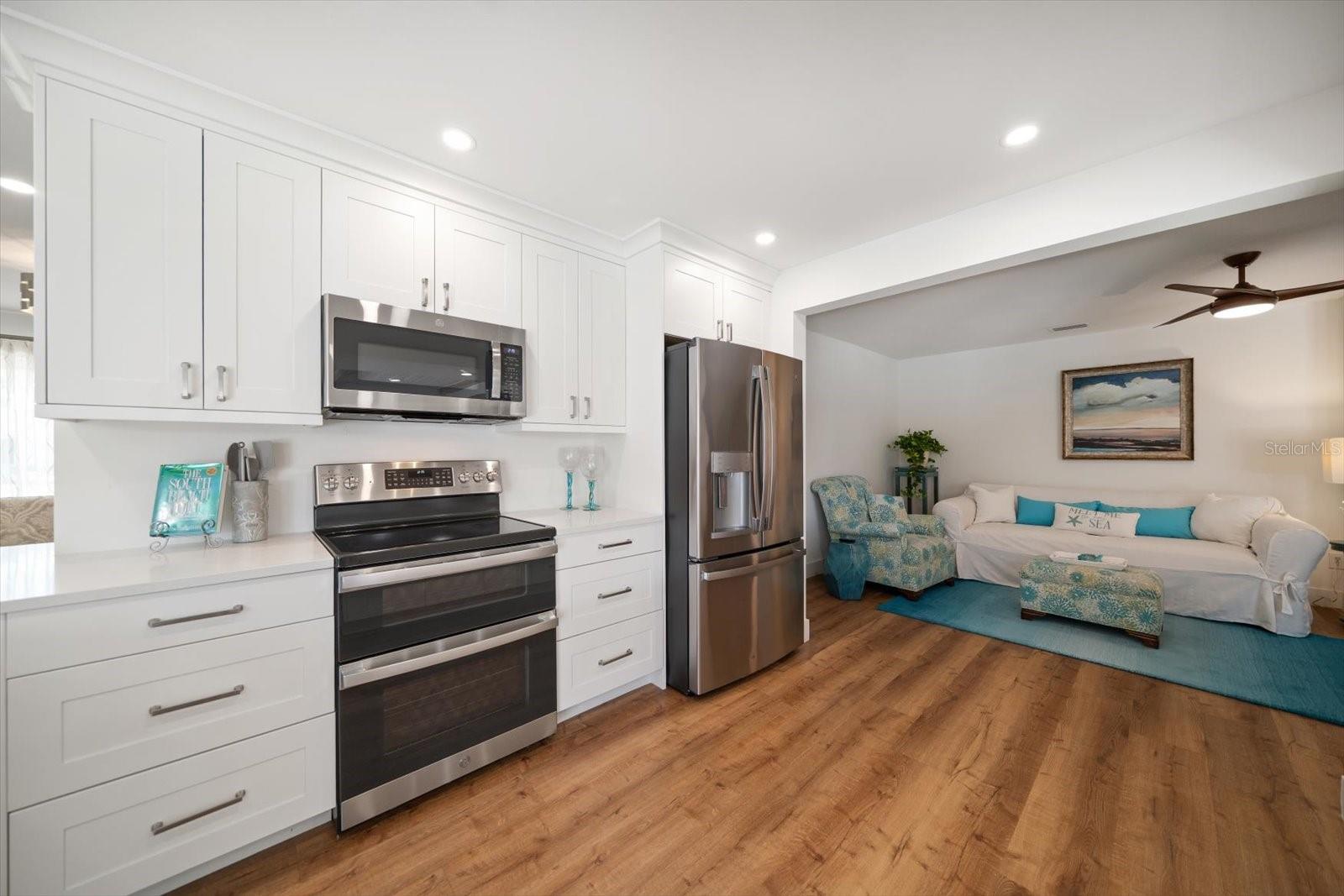 Open concept family room to kitchen