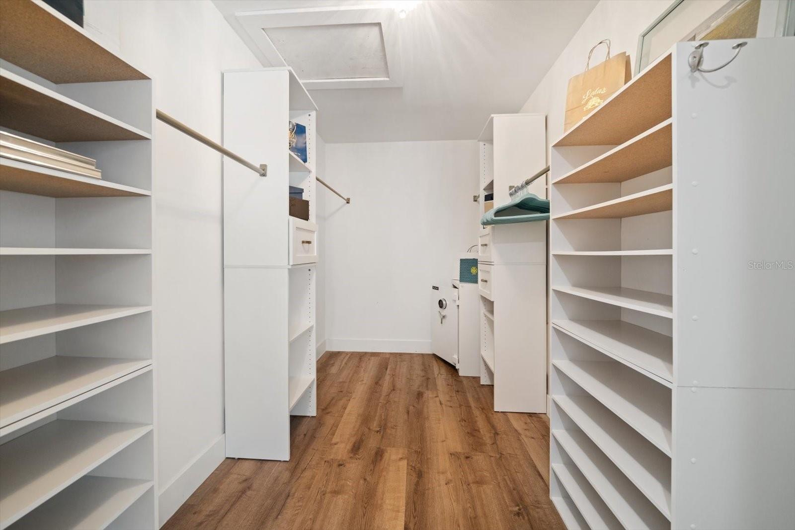 Spacious primary bedroom closet.