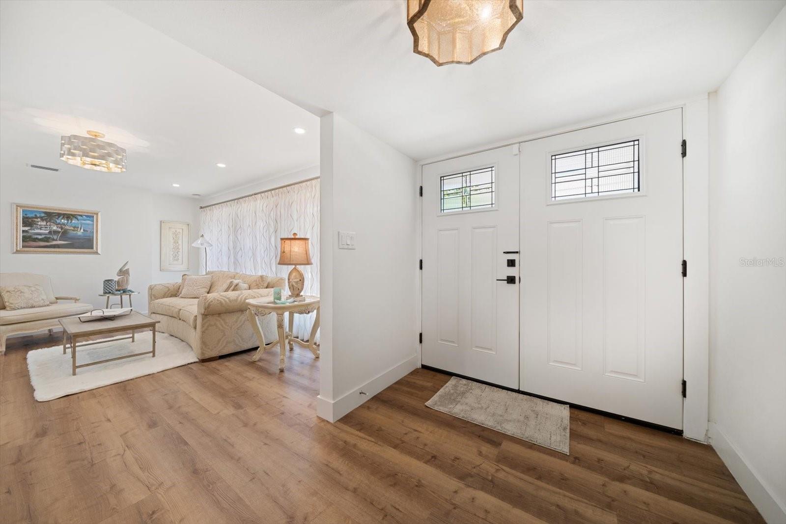 Inviting foyer bathed in natural light!
