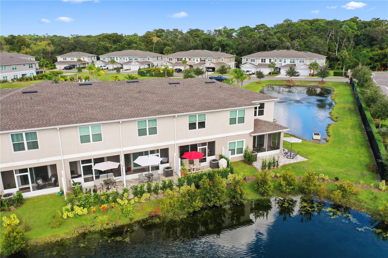 Back of building with natural pond
