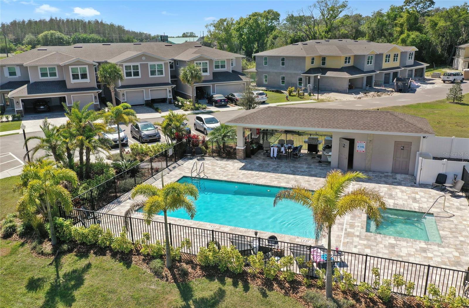 Pool, spa tub and outdoor kitchen