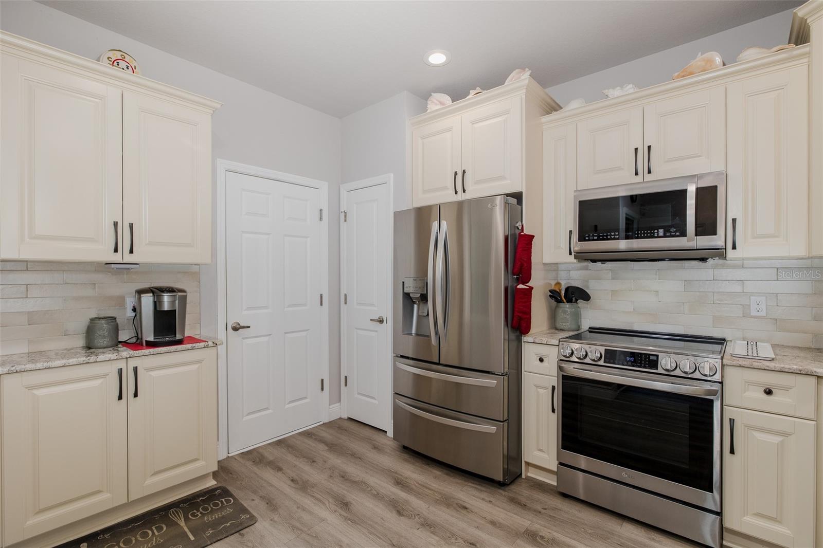 Kitchen with garage entrance in back