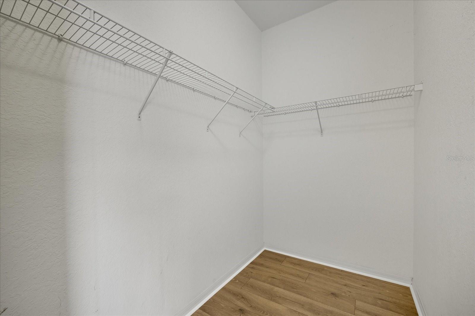Primary Bedroom walk-in closet