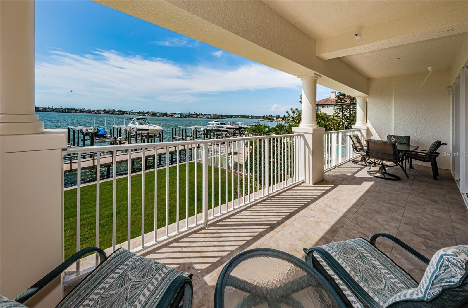 .. Balcony Looking Right -   This Section is Outside Great Room 30' X 7'... Master Bedroom Suite behind Camera has another 15 Feet of Balcony. Total Waterfront Balcony Size 45 ' X 7'.. Shot with Furniture.