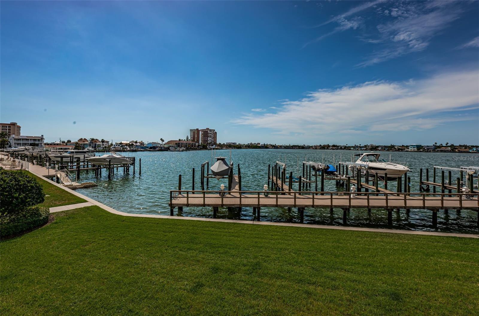 ... View From the Balcony of La Bahia Residence #202... Many a day You will spot Manatees and Dolphins Frolicking off the Docks Training Their Young in This Protected Part of Boca Ciega Bay.