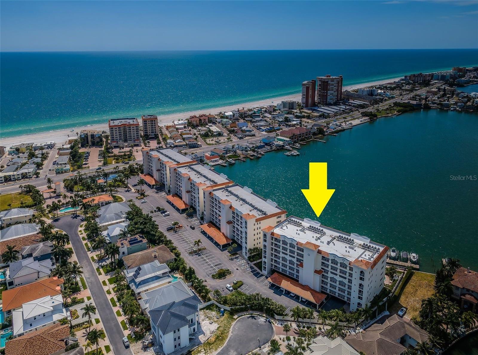 ..NEW ROOF INSTALLED MAY 2025.. Arrow over Building #4 La Bahia. Redington Shores Yacht & Tennis Club Consists 4 Condominium Building & about 88 Single Family Homes in a Secured 24 Hour Guard Gated Community located in Redington Shores Florida 33708.