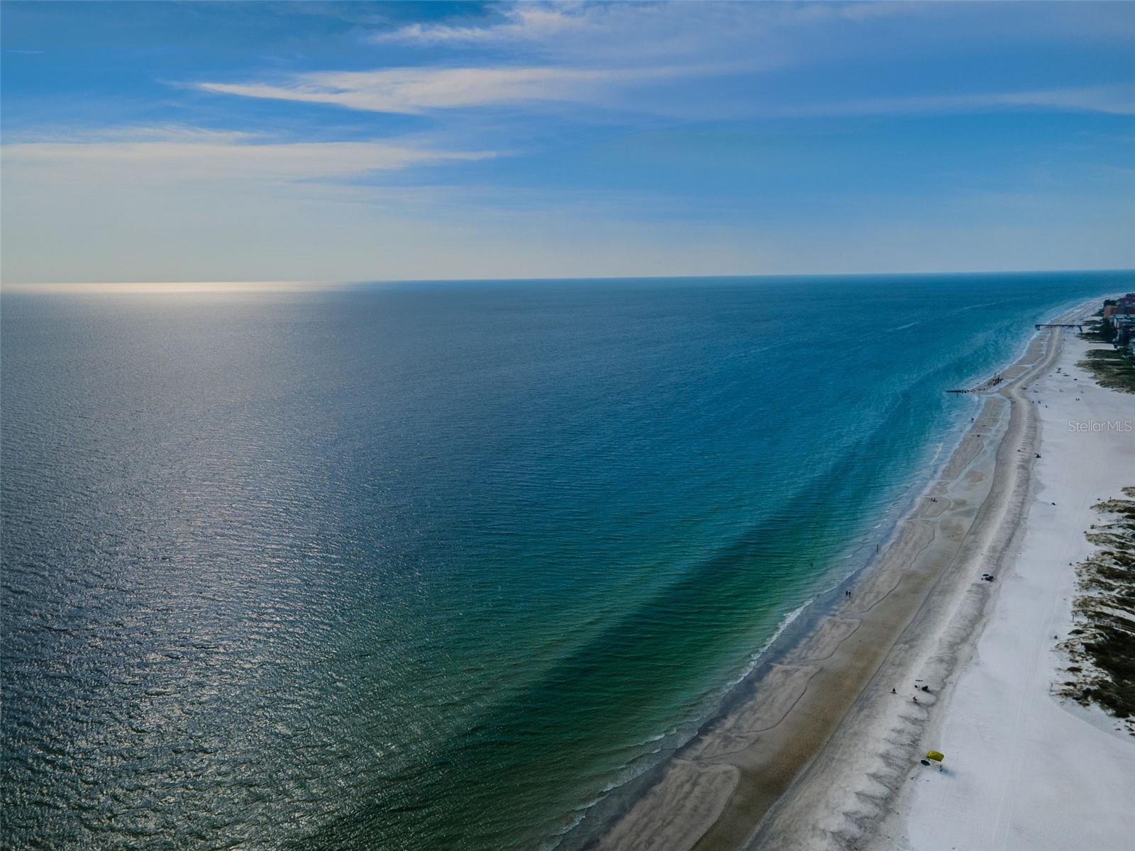 ... Redington Shores Looking North...Town runs about 1.5 Miles along the Beach Located about Halfway between St Pete Beach and Clearwater Beach... Water Temp is around 88 Degrees. It will Truly Heal any Aches and Pains You Have.. This Particular Beach Shot Was Taken About One Hour Before Sunset After A Late Afternoon Shower.