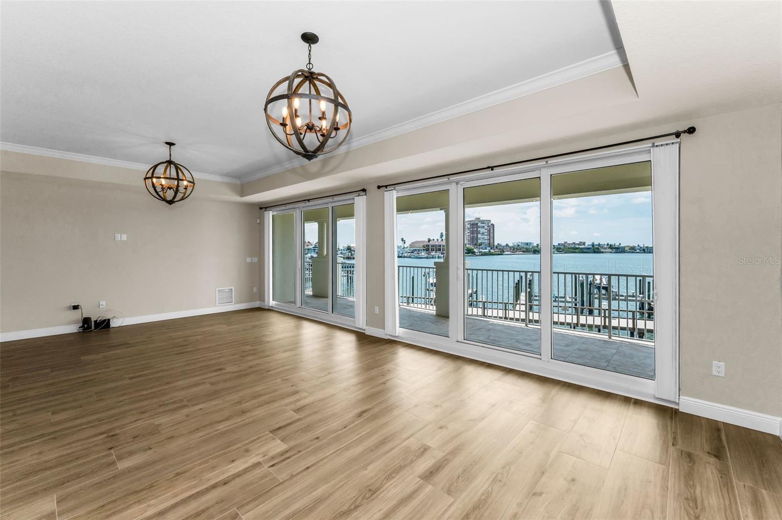 .. .. La Bahia Building - Residence # 202 consists of a 4 Bedroom 3.5 Bath with 3020 Sq Feet. The 4th Bedroom   is a  12' x 15' Flex Room / Home Office / Media Room which can also be used as  4th Bedroom if Desired. Condo Unit is Fronted with a 45' Foot Waterfront Balcony.. NOTE: Balcony without Furniture.