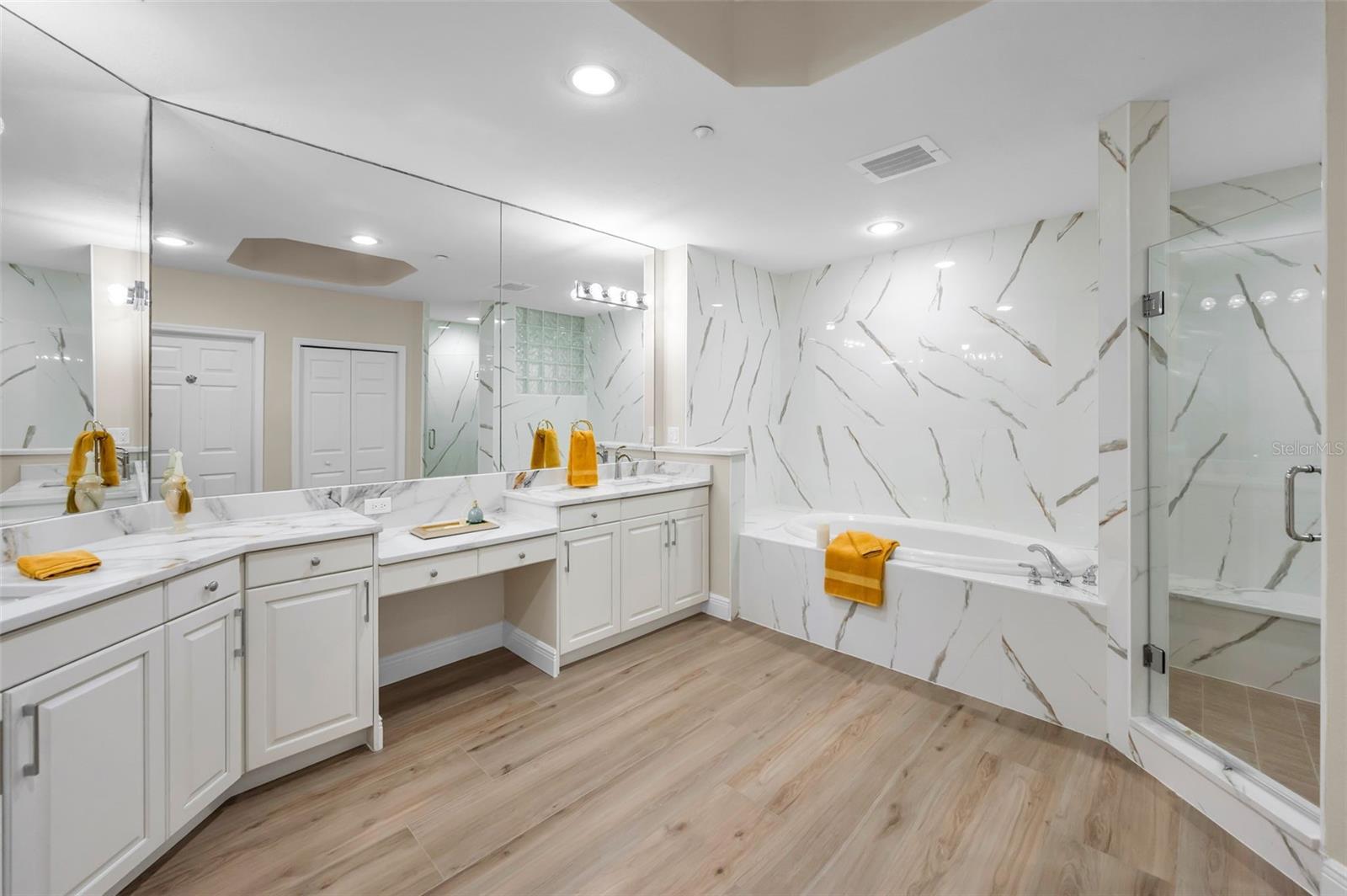 ..Remodeled Large Master Bath - with Double Vanity, Prep Area, Spa Soaking Tub, Walk-in Shower and Privacy Room.