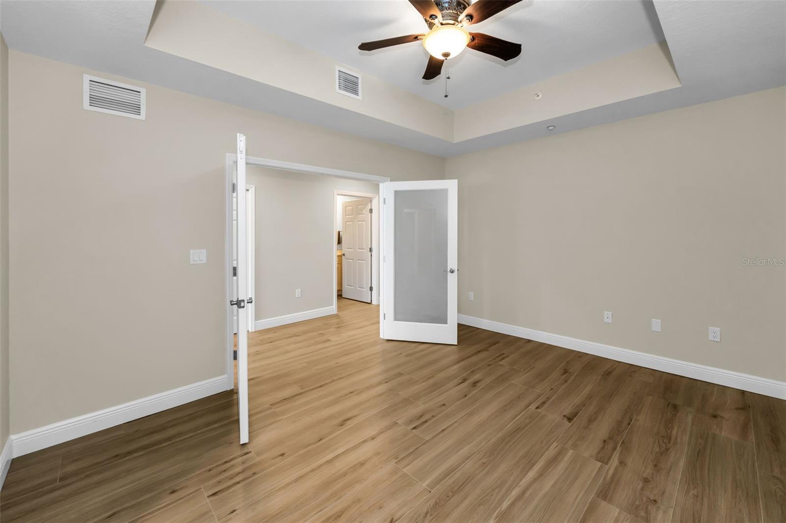 .. 12-by-15-foot flex room/home office/media room that can be easily made into a 4th Bedroom if needed. Room has a remodeled 1/2 Bath with Sink & Commode. All New Flooring Thru out Unit & Wall Finish.